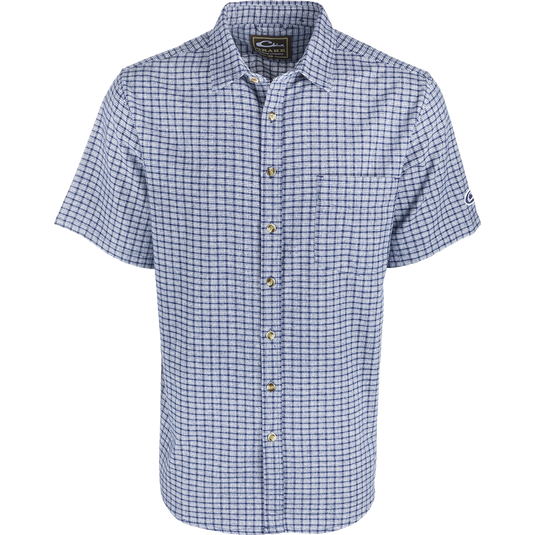 A NeverTuck Shirt S/S, blue and white checkered shirt made of soft-washed 100% cotton. Features an open collar style and left chest pocket. 