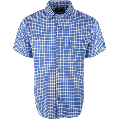 A blue and white plaid NeverTuck Shirt S/S made of soft-washed 100% cotton. Features include an open collar style and a left chest pocket. Perfect for looking and feeling your best. From Drake Waterfowl, a store known for high-quality hunting gear and casual apparel.
