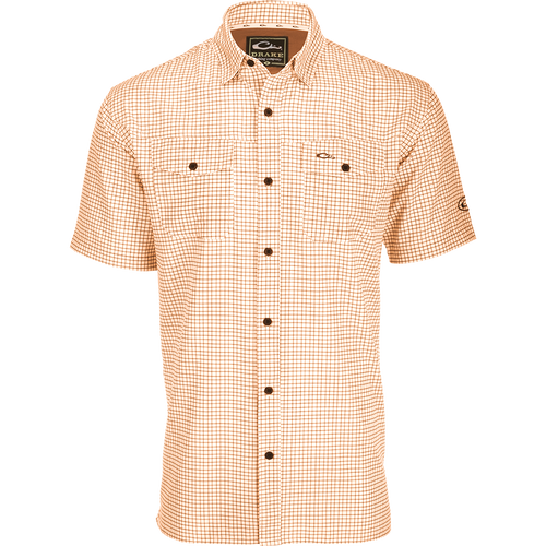 Traveler's Minigrid Short Sleeve Shirt with Four Way Stretch and split tail hem for comfort and style. Lightweight, wrinkle-resistant fabric.