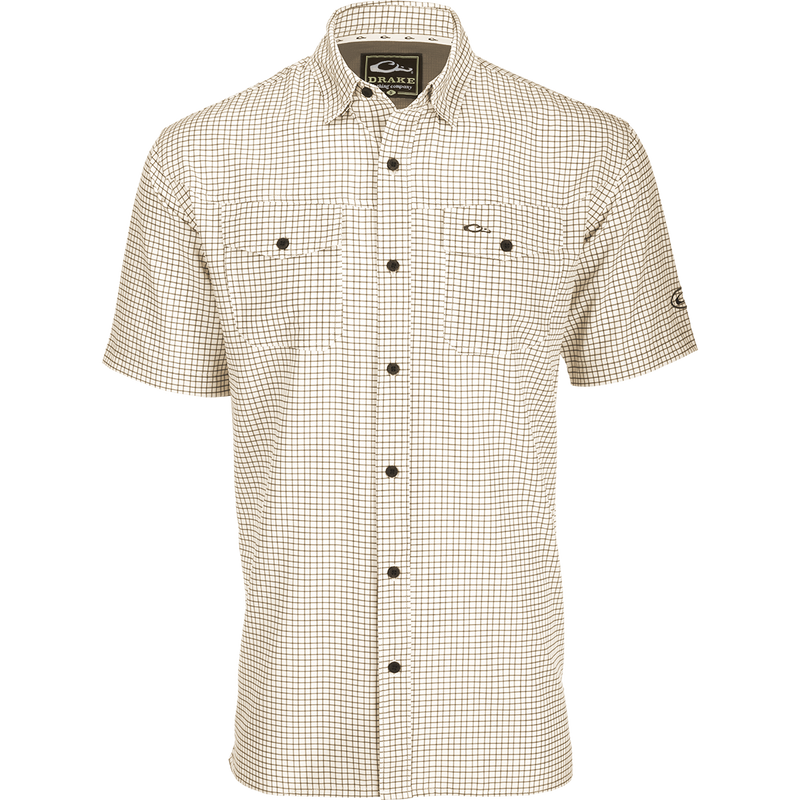A lightweight, Four Way Stretch Traveler's Minigrid Short Sleeve Shirt with hidden button-down collar and split tail hem. Perfect for the man on the go.