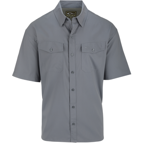A grey dobby-textured button-up shirt with hidden button-down collar and two chest pockets. Classic fit, versatile for any occasion.