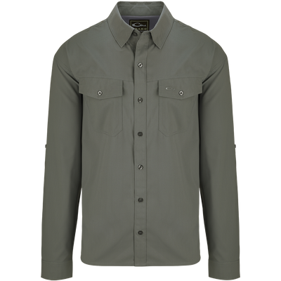 Traveler's Solid Dobby Shirt L/S: A classic fit, long-sleeved shirt with hidden button-down collar, chest pockets, and split tail hem. Made of featherweight, moisture-wicking fabric with UPF30 sun protection.