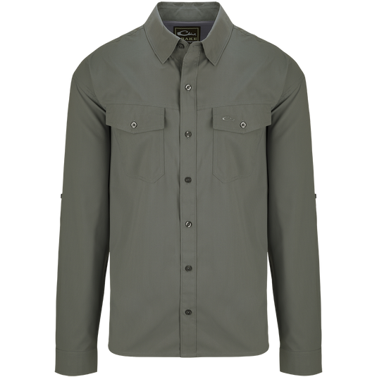 Traveler's Solid Dobby Shirt L/S: A classic fit, long-sleeved shirt with hidden button-down collar, chest pockets, and split tail hem. Made of featherweight, moisture-wicking fabric with UPF30 sun protection.