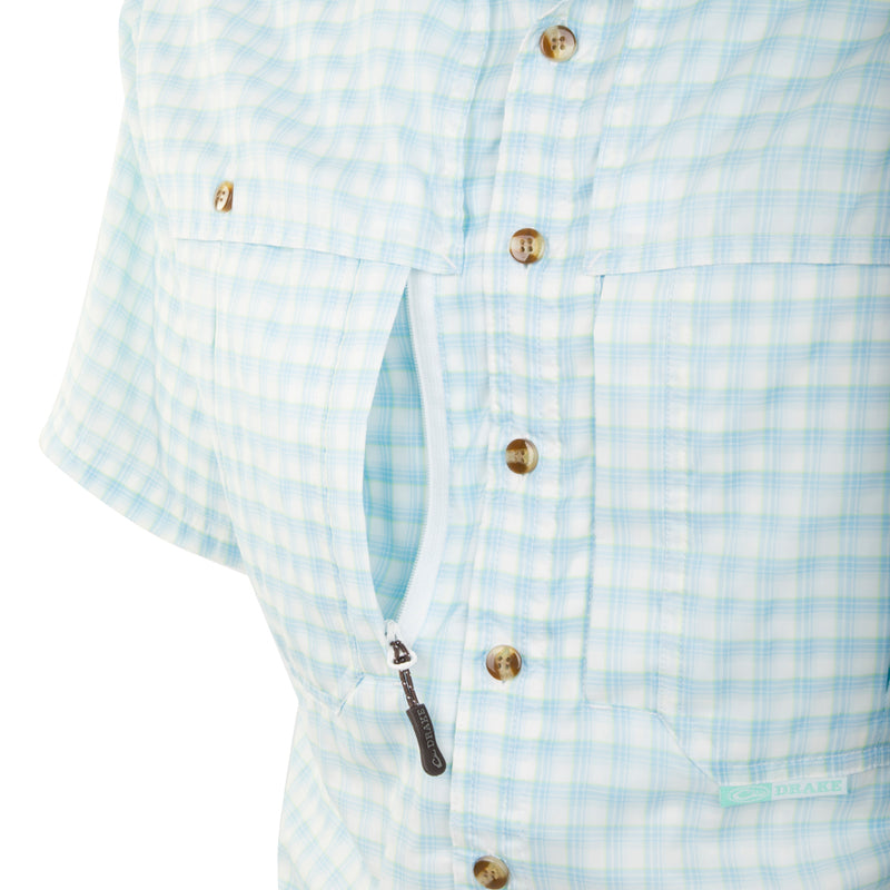 FeatherLite Plaid Wingshooter's Shirt S/S: A close-up of a lightweight, breathable shirt with a button-down collar and large chest pockets.