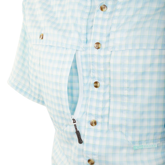 FeatherLite Plaid Wingshooter's Shirt S/S: A close-up of a lightweight, breathable shirt with a button-down collar and large chest pockets.
