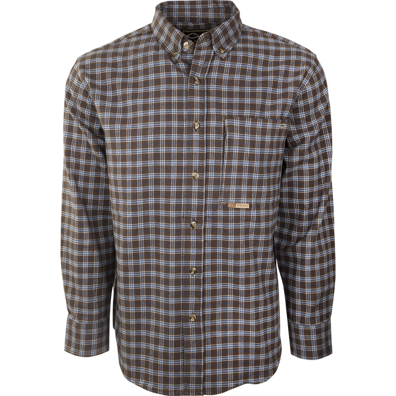 A brown plaid long-sleeved shirt with buttons, made from 100% brushed cotton twill. Features a left chest pocket and hidden zippered vertical pocket. Perfect for fall and winter outdoor activities or work. From Drake Waterfowl, known for high-quality hunting and casual apparel.