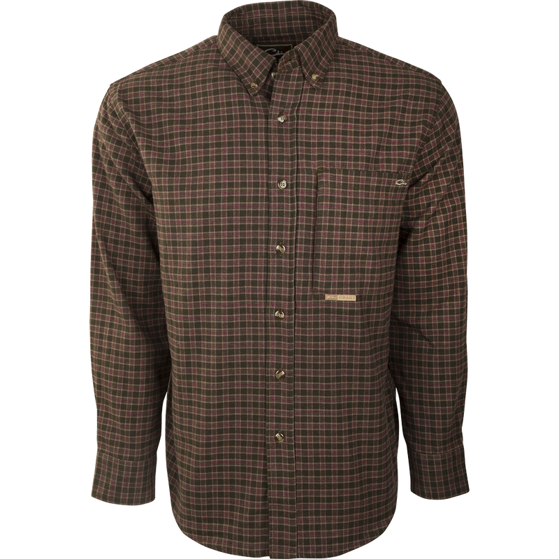 A close-up of the Autumn Brushed Twill Shirt, a long-sleeved button-up shirt made from 100% brushed cotton twill. It features a left chest pocket with a hidden zippered pocket behind and a button-down collar. Perfect for fall and winter outdoor activities or workdays.
