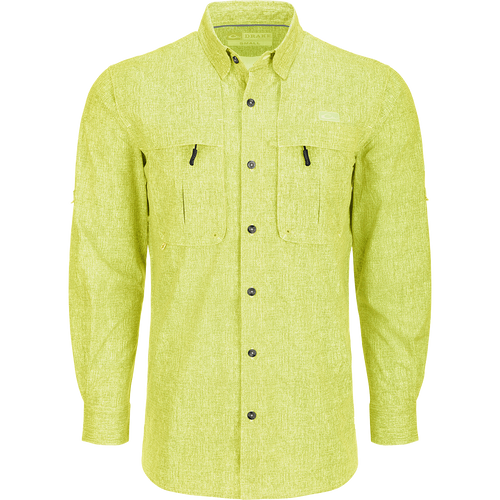 Heritage Heather Shirt L/S: Performance-driven yellow shirt with black buttons. Lightweight, moisture-wicking fabric with UPF30 sun protection. Hidden button-down collar, vented cape back, and two front chest pockets. Adjustable roll-up sleeve tab and split tail hem. Ideal for outdoor activities or office wear.