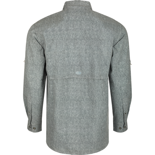 Heritage Heather Shirt L/S: A grey shirt with a back view, featuring a cape back with mesh ventilation, hidden button-down collar, and two front chest pockets. Lightweight, moisture-wicking fabric with UPF30 sun protection. Perfect for performance on the water or at the office.