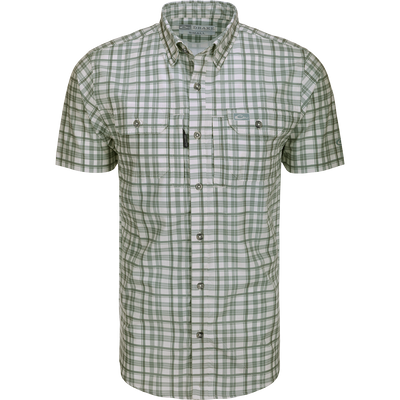 Hunter Creek Window Pane Plaid Shirt S/S: A lightweight, moisture-wicking shirt with micro-mesh for natural cooling, UPF 30 sun protection, and hidden button-down collar. Features include vented back cape, chest pockets with Magnattach™ and YKK zipper closures, sculpted hem, and built-in sunglass wipe.