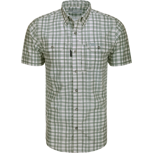 Hunter Creek Window Pane Plaid Shirt S/S: A lightweight, moisture-wicking shirt with micro-mesh for natural cooling, UPF 30 sun protection, and hidden button-down collar. Features include vented back cape, chest pockets with Magnattach™ and YKK zipper closures, sculpted hem, and built-in sunglass wipe.