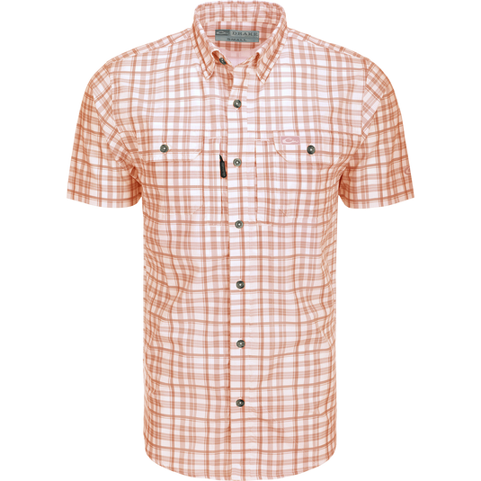 Hunter Creek Window Pane Plaid Shirt S/S: A lightweight, moisture-wicking shirt with hidden collar buttons, vented back, and chest pockets with zipper and Magnattach closure. Sculpted hem and built-in sunglass wipe for added convenience.