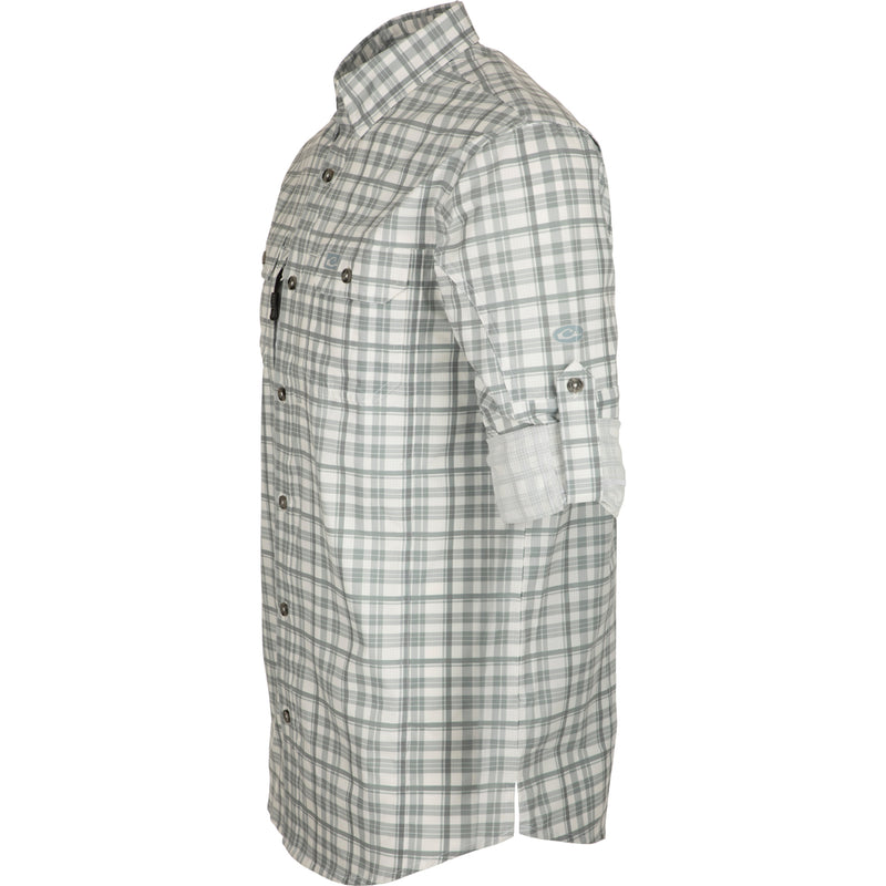 Hunter Creek Window Pane Plaid Shirt L/S: A lightweight, moisture-wicking shirt with UPF 30 sun protection. Features include hidden button-down collar, vented back cape, and chest pockets with Magnattach closure. Sculpted hem and built-in sunglass wipe for added convenience.