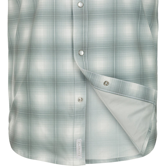 Cinco Ranch Western Plaid Shirt: Close-up of a lightweight, moisture-wicking shirt with micro-mesh for natural cooling and UPF 30 sun protection. Features include hidden button-down collar, vented Western back, and two button-through chest pockets.