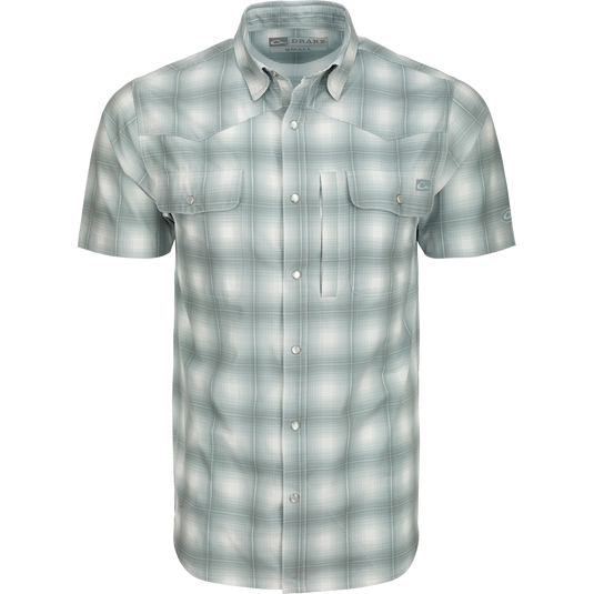 Cinco Ranch Western Plaid Shirt S/S: A lightweight polyester shirt with micro-mesh for natural cooling, UPF30 sun protection, and moisture-wicking technology. Features include a hidden button-down collar, vented Western back, and two button-through chest pockets. Perfect for hunting, fishing, or casual wear.