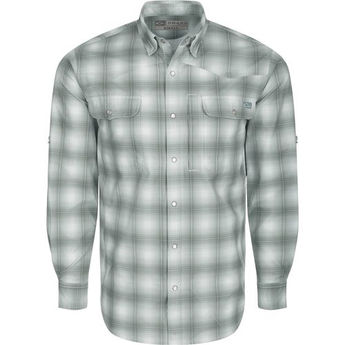 Cinco Ranch Western Plaid Shirt L/S: A lightweight, moisture-wicking polyester shirt with a hidden button-down collar, vented back, and two chest pockets. Features include UPF 30 sun protection, faux pearl snaps, and an adjustable roll-up sleeve with tab holder. Perfect for hunting, fishing, or casual wear.