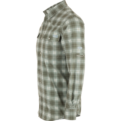 Cinco Ranch Plaid Long Sleeve Shirt with western vibes, UPF 30 sun protection, moisture-wicking, and quick-drying capabilities. Hidden button-down collar, faux pearl snap buttons, adjustable roll-up sleeves. Lightweight 100% Polyester.