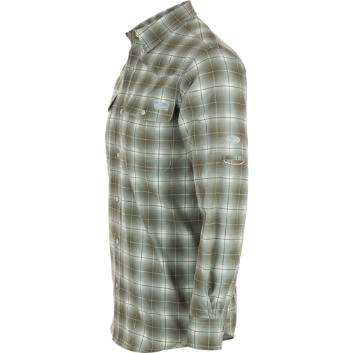 Cinco Ranch Plaid Long Sleeve Shirt with western vibes, UPF 30 sun protection, moisture-wicking, and quick-drying capabilities. Hidden button-down collar, faux pearl snap buttons, adjustable roll-up sleeves. Lightweight 100% Polyester.