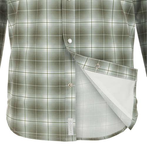 Cinco Ranch Plaid Long Sleeve Shirt with hidden button-down collar and pearl snap buttons. Lightweight, breathable 100% Polyester fabric with UPF 30 sun protection and moisture-wicking capabilities. Adjustable roll-up sleeves and tab holders for versatility.