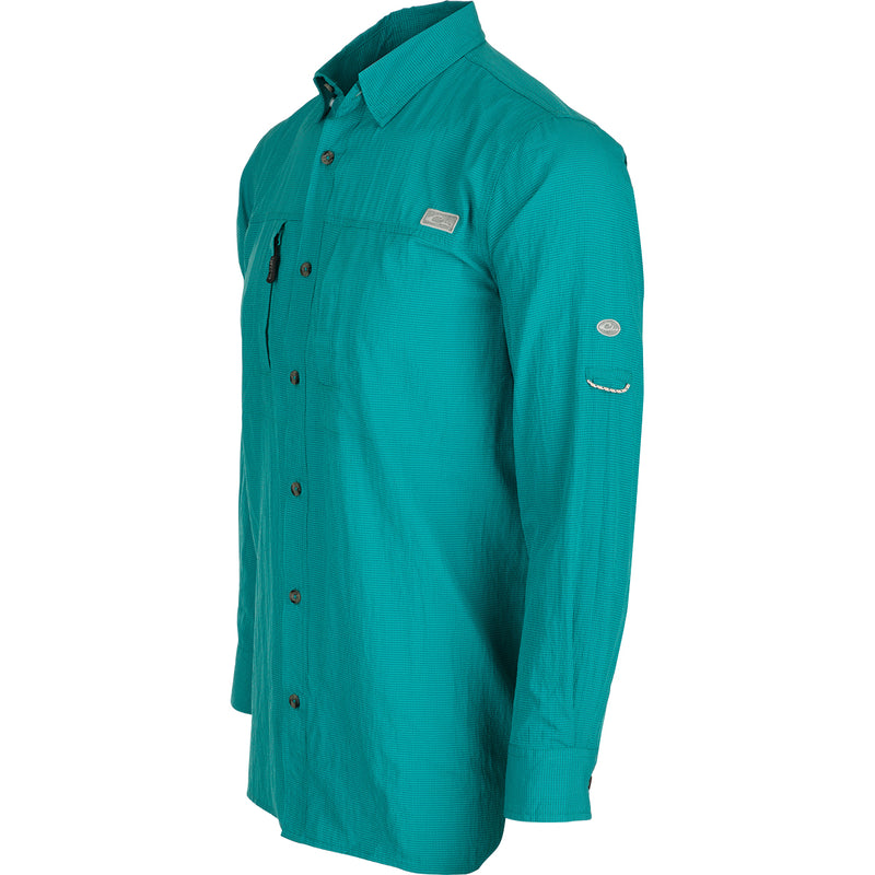 Classic Seersucker Minicheck Shirt L/S: A blue shirt with buttons, hidden zippered chest pocket, and a vented cape back.