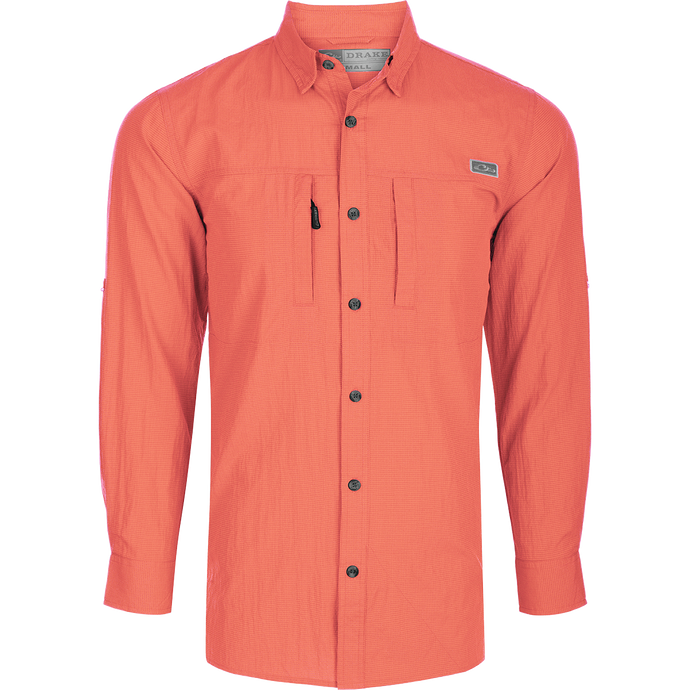 Classic Seersucker Minicheck Shirt L/S: A soft, featherweight shirt with a hidden button-down collar, zippered chest pocket, and magnet closure. Features UPF30 sun protection, moisture-wicking fabric, and a vented cape back for added ventilation. Perfect for hunting and outdoor activities.