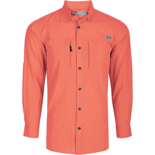 Classic Seersucker Minicheck Shirt L/S: A soft, featherweight shirt with a hidden button-down collar, zippered chest pocket, and magnet closure. Features UPF30 sun protection, moisture-wicking fabric, and a vented cape back for added ventilation. Perfect for hunting and outdoor activities.