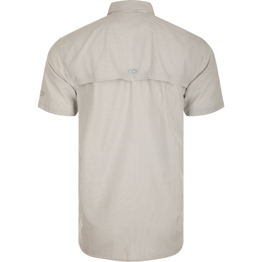 Classic Seersucker Stripe Shirt S/S, back view. Moisture-wicking, UPF 30 sun protection. Button-down collar, vented cape back. Zippered chest pocket, Magnattach™ closure. Split tail hem, built-in sunglass wipe. High-quality hunting gear by Drake Waterfowl.