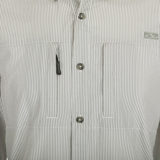 Classic Seersucker Stripe Shirt: A close-up of a shirt with a button-down collar and hidden zippered chest pocket. Made from performance fabric for moisture-wicking and quick drying. Vented cape back for ventilation.