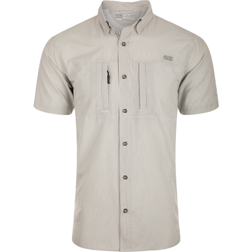 Classic Seersucker Stripe Shirt: A close-up of a soft, featherweight shirt with a button-down collar, hidden zippered chest pocket, and Magnattach™ closure. Vented cape back and split tail hem for ventilation.