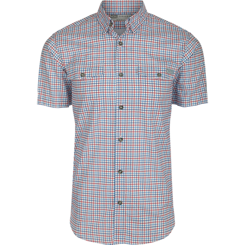 Frat Tattersall Shirt S/S - A lightweight performance shirt with UPF30 sun protection, moisture-wicking fabric, and a hidden button-down collar. Features include vented cape back, button-through flap chest pockets, sculpted hem, and built-in sunglass wipe. Classic styling meets technical functionality.