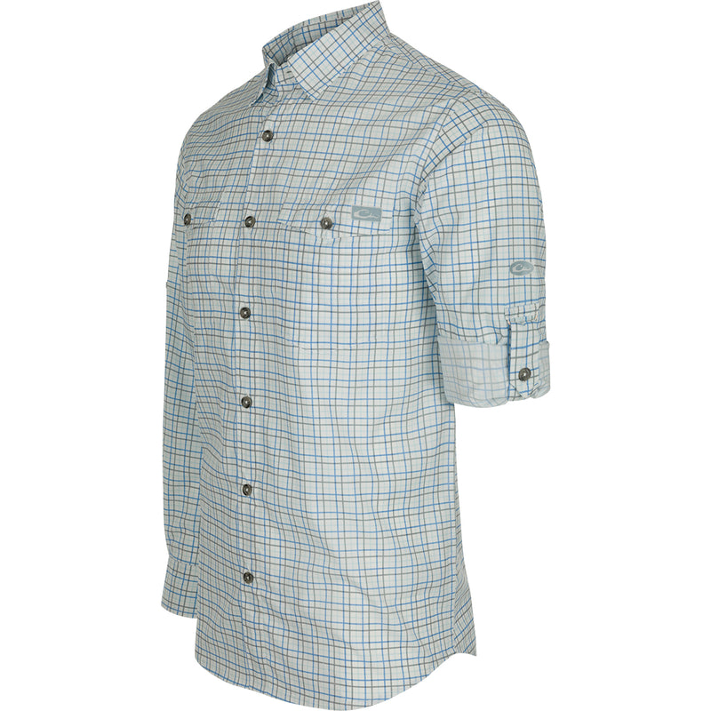 A classic fit Frat Tattersall Shirt with hidden button-down collar, chest pockets, and vented cape back. Lightweight, moisture-wicking, and UPF30 for sun protection. Sculpted hem with built-in sunglass wipe.