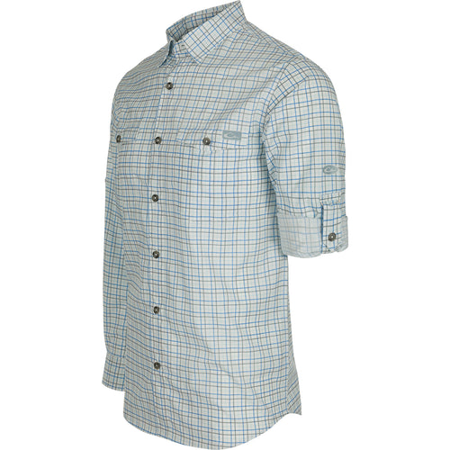 A classic fit Frat Tattersall Shirt with hidden button-down collar, chest pockets, and vented cape back. Lightweight, moisture-wicking, and UPF30 for sun protection. Sculpted hem with built-in sunglass wipe.