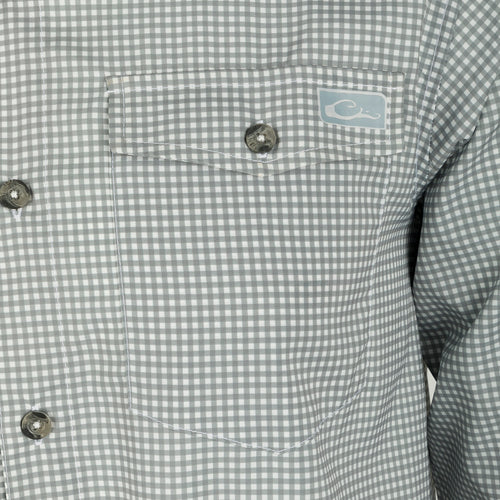 Frat Gingham Check Shirt L/S - Close-up of lightweight, moisture-wicking shirt with hidden button-down collar, chest pockets, and vented cape back. Sculpted hem and adjustable roll-up sleeves.