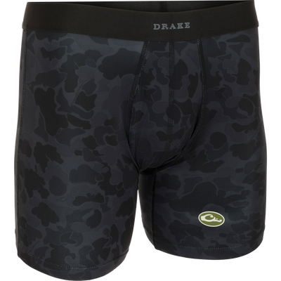 A close-up of the Commando Boxer Brief, a black camouflage underwear with a functional fly and elastic waistband. Made with moisture-wicking fabric and four-way stretch for total freedom of movement.