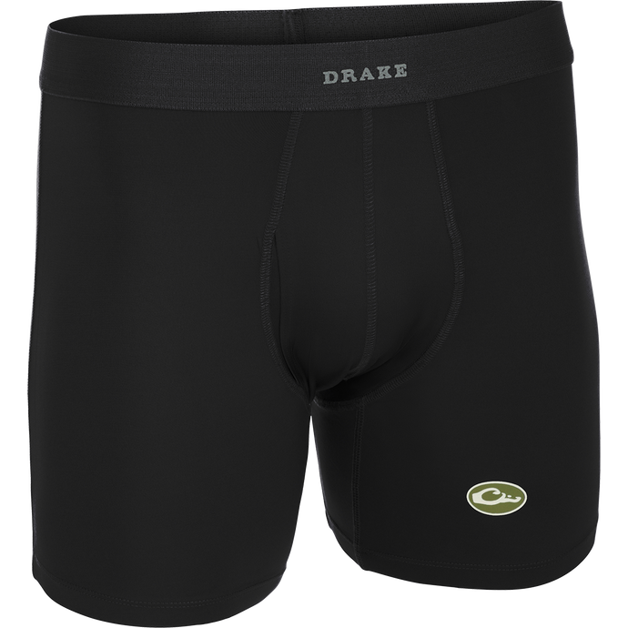 Commando Boxer Brief: A black boxer briefs with a logo, offering four-way stretch, moisture-wicking fabric, and a functional fly for ultimate comfort and freedom of movement.