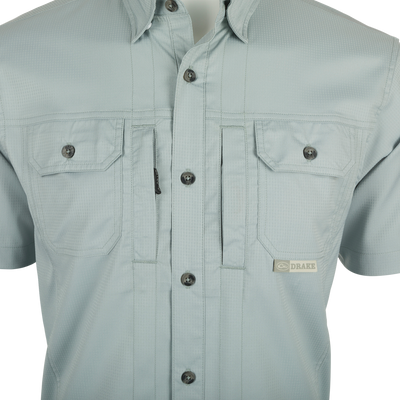 Wingshooter Trey Solid Dobby Shirt S/S, close-up of performance features like hidden collar, vented back, and chest pockets.