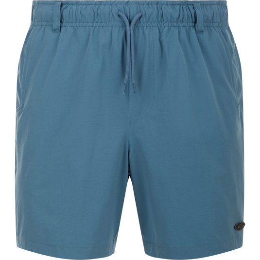 Dock Short 6" - A durable, quick-drying nylon/spandex blend with water-resistant finish. Features elastic waist, drawstring, mesh pockets, and YKK zippered back pockets. Perfect for boat to dock transitions.