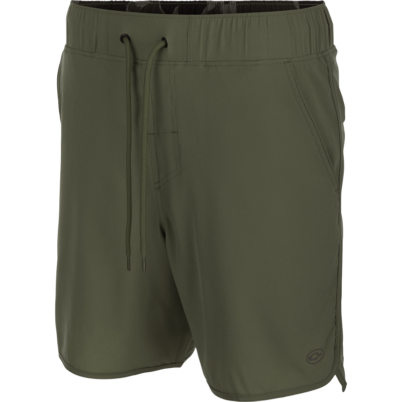 A pair of Commando Lined Volley Shorts with a built-in liner, scalloped hem, and adjustable drawstring waistband. Features quick-drying fabric, 4-way stretch, and YKK zippered pockets. Perfect for beach to bar style.