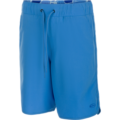 A versatile Commando Lined Volley Short 9 inch with built-in liner. Features quick-drying fabric, 4-way stretch, and adjustable waistband. Includes front and back pockets with hidden zippers. Perfect for beach to bar.