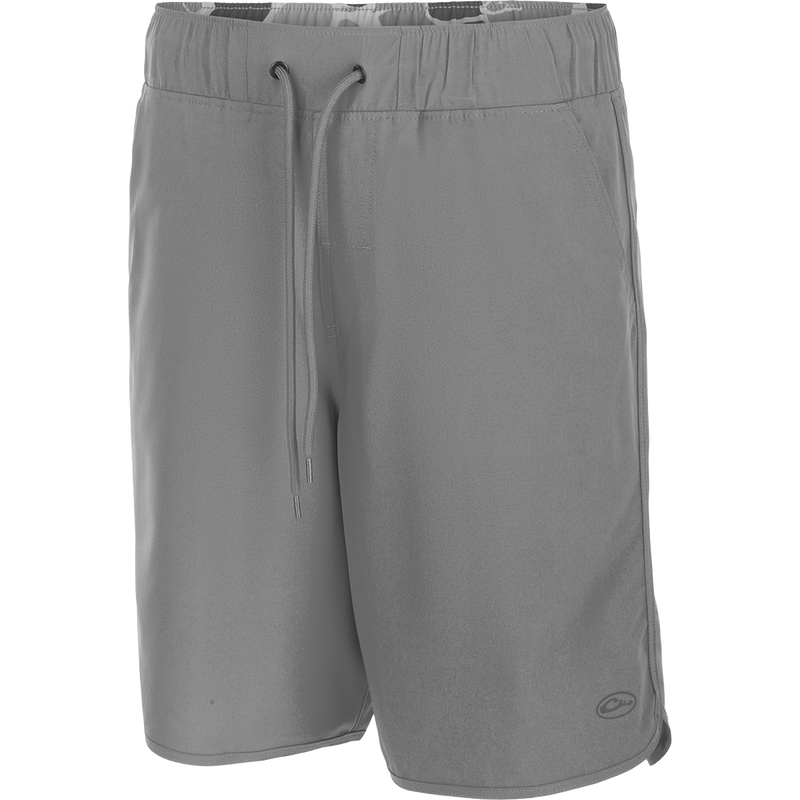 Commando Lined Volley Short 9 Inch Grey shorts with drawstring, scalloped hem, and hidden zipper pockets. Versatile and quick-drying for beach to bar.