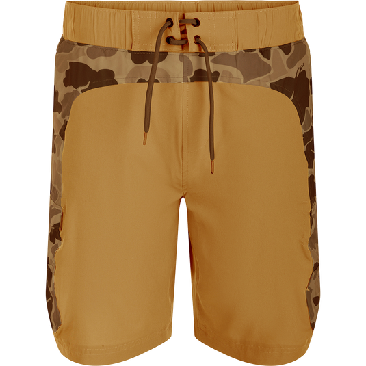 Commando Lined Board Short 9": A versatile pair of shorts with camouflage pattern, 4-way stretch, quick-drying fabric, and built-in liner. Features cargo pockets, elastic waistband, and adjustable drawstring. Perfect for beach to bar transitions.