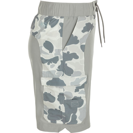 A pair of Commando Lined Board Shorts with a camouflage pattern, featuring 4-way stretch, quick-drying fabric, and dual cargo pockets.
