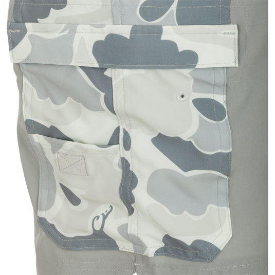 Commando Lined Board Short 9" - Close-up of versatile khaki shorts with clean lines, cargo pockets, and adjustable waistband. Built-in liner, quick-drying, and moisture-wicking fabric for beach to bar comfort.