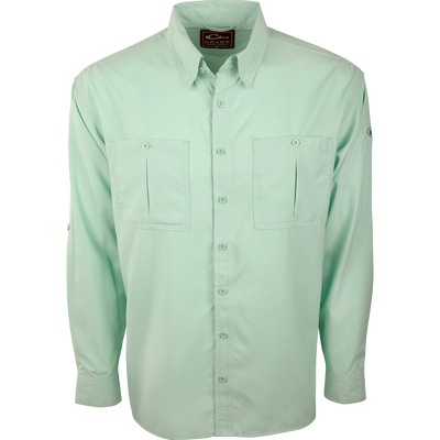 A close-up of the Flyweight Shirt with Vented Back L/S. A green button-up shirt made of ultra-lightweight polyester. Features include Sol-Shield™ UPF 50+ sun protection, vented mesh back, and horizontal chest pockets. Quick-drying, moisture-wicking, and breathable.