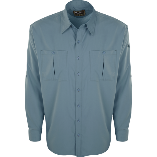 A Flyweight Shirt with Vented Back L/S, featuring buttons and pockets. Lightweight, breathable, and quick-drying for warm-weather outdoor activities. Sol-Shield™ UPF 50+ sun protection, vented mesh back, and chest pockets.