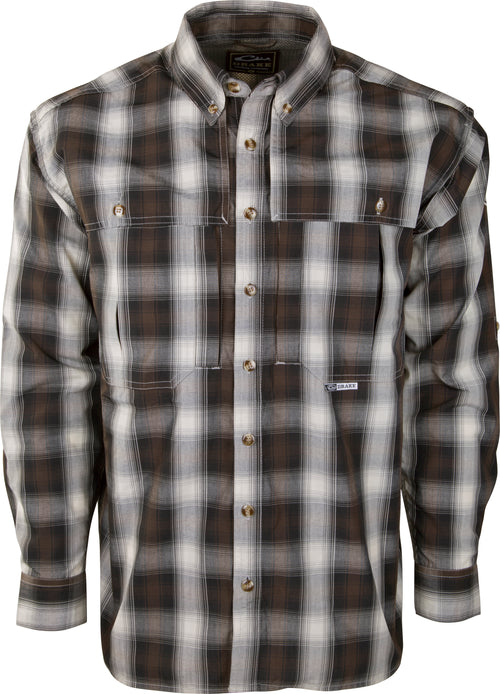A close-up of the OL - Wingshooter's Small Check Plaid L/S shirt with buttons, offering UPF 30+ protection and breathable fabric for outdoor activities.