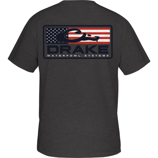 Patriotic Bar T-Shirt: Back view of a grey tee with a screen print of an American Flag and the Drake Logo from the Americana Series. Features a Drake Waterfowl logo on the front left chest pocket.