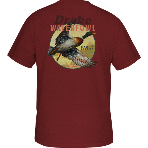 Red shirt with a duck graphic from the Vintage Drake Series, featuring a Mallard flying in the air. Drake logo on front pocket. Lightweight and comfortable fabric blend. Final sale item.