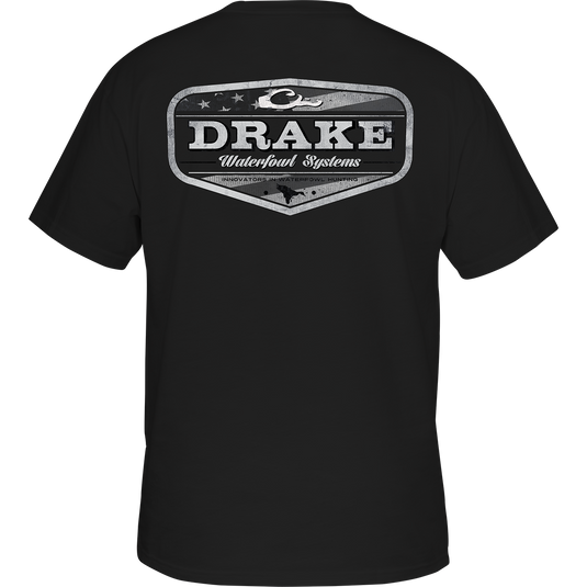 Blackout Badge T-Shirt with Drake logo on front pocket and Americana badge graphic from Americana Drake Series on back.