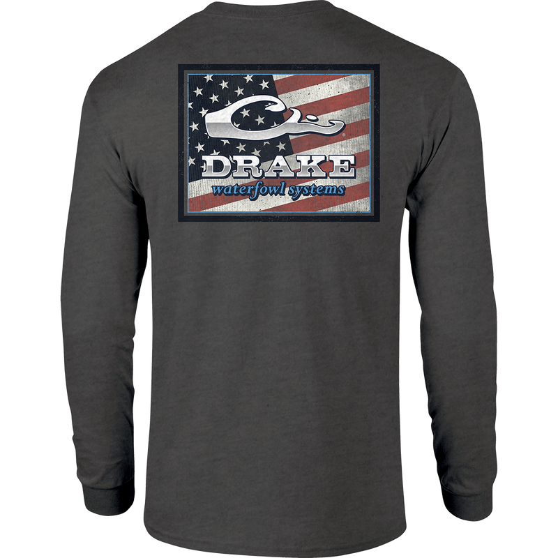 A long sleeved shirt with an American flag and Drake logo overlay.